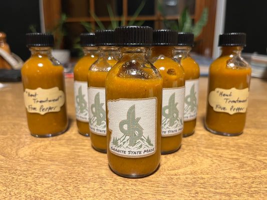 "Heat Treatment" Five Pepper hot sauce